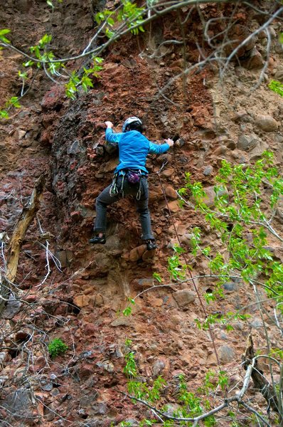Allison heading left to the faint arête above. May 2014.