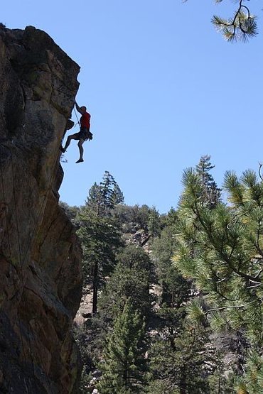 Jason clipping the anchors on Out of Sight (5.10b), 8000 Foot Crag