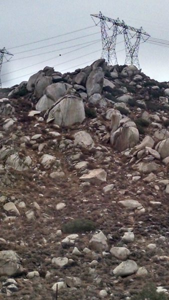 The High voltage hill behind the church featuring the Lizard King Boulders