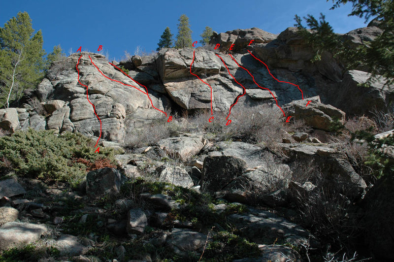 A - 5.4, a little bouldering mantel at the start is the real fun. <br>
B - 5.2 access to the top. <br>
C - hardest route on this wall. The roof is a 5.9. <br>
D - A fun 5.8 route. <br>
E - the central crack. Fun. <br>
F - a fun 5.6 face route that starts with a lay-back up a crack to access the face.