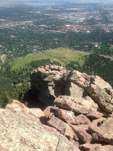 Working the traverse pitches on the First Flatiron Direct route