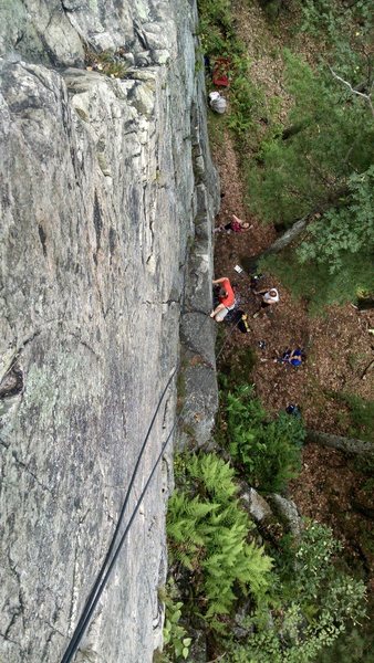 Looking down on the route. The climber is hiking up the 5.4 section to the first ledge.