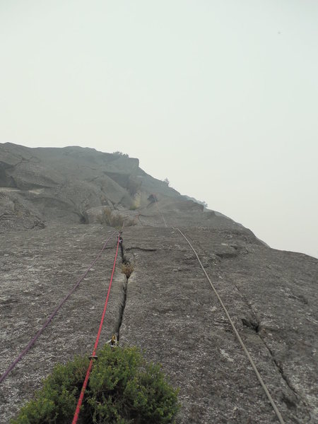 P7 "The Trumpet" during the Rim Fire.<br>
All cleaned up for classic free climbing.<br>
Steve Bosque on the lead.