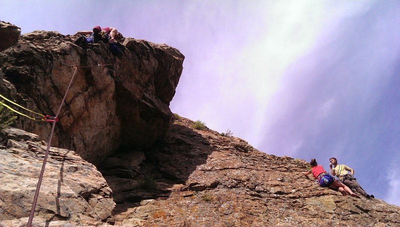 Garrett resting half way up the 2nd pitch. Matt & Erica atop Mega.