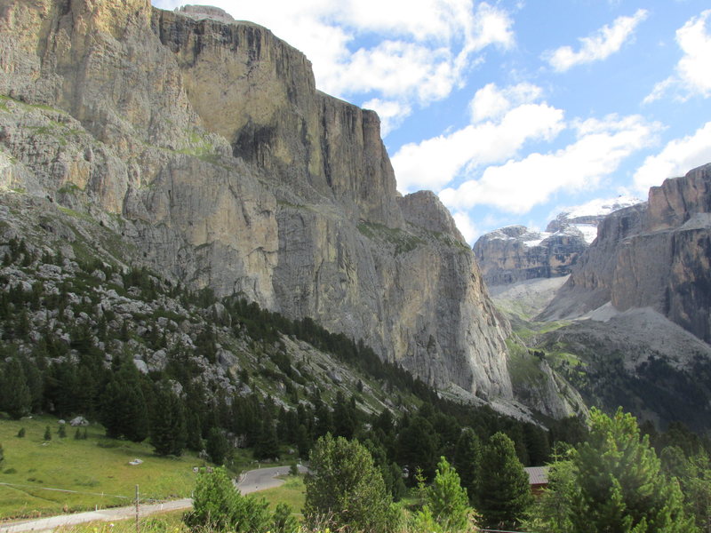 Piz Ciavazes from Sella Pass highway descending towards Canazei.