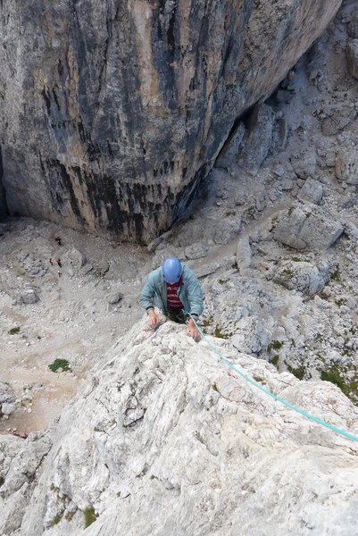 Exposed climbing, one foot on either side of the knife edge!