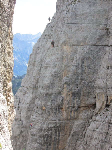 Unknown climbers on Torre Lusy (skyline), and Torre Barancio.