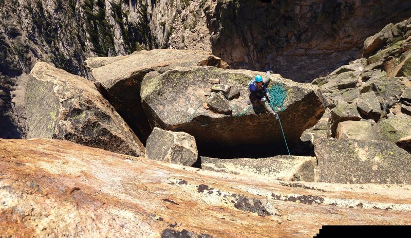 Pat belaying below the summit.