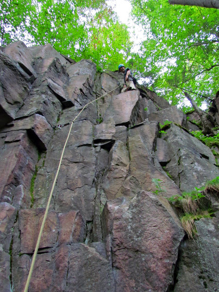 Colin Loher on the most obvious ledge of the route. All but the very bottom and top of the route is in view.