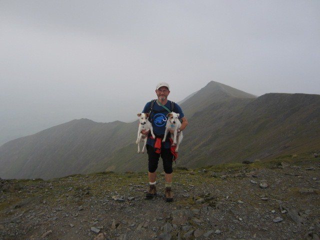 On the summit. A misty day .