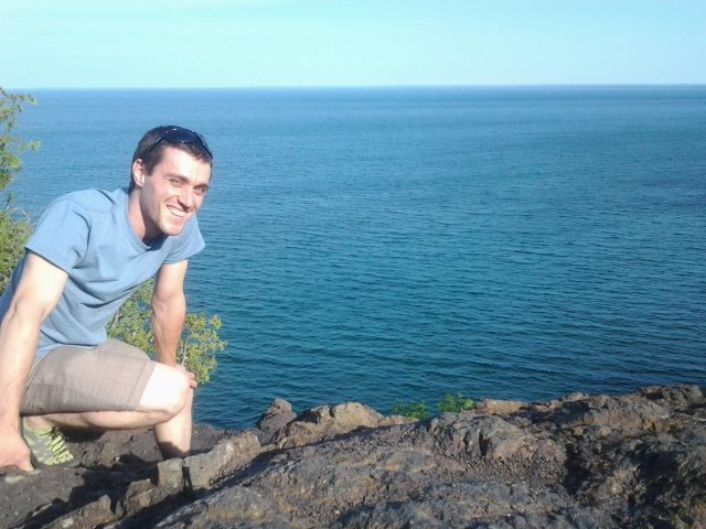 Climbing The Pinnacle with C at Presque Isle Park, Marquette. Photo by Caitlin.