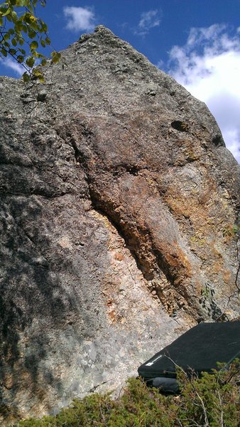 This boulder is hiding just off the trail