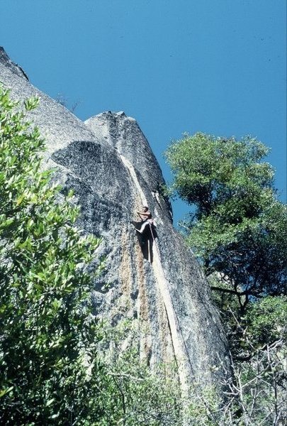 Climber in the OW crux of The Bin