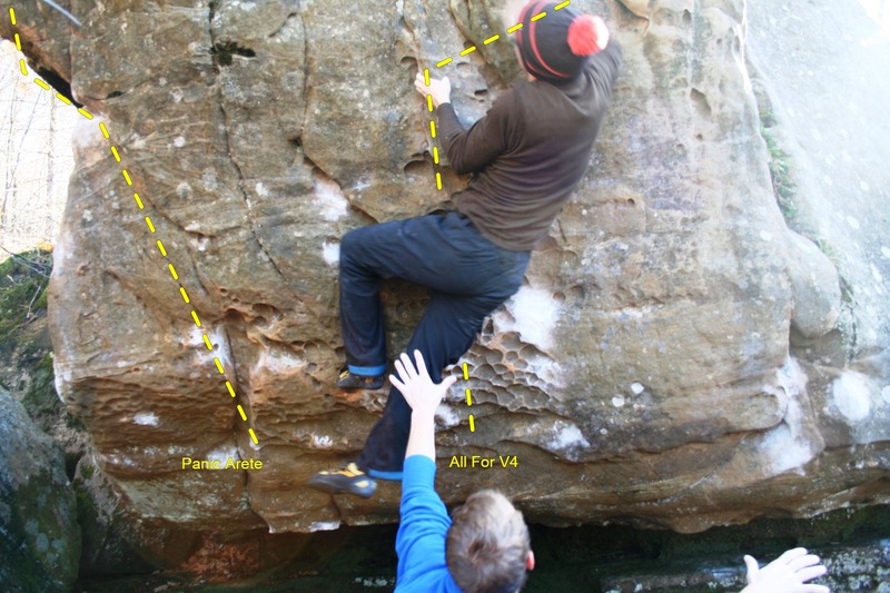 Levi on All For V4 - see other picture for description. Left of this problem is Panic Arete, V5. Dotted line is approximate route. Wipe off your feet before every attempt, this problem is over a sand bar. Climbing with sandy shoes will degrade the rock quality, don't do it! Sometimes can't be climbed due to water levels. Don't climb wet rock here!