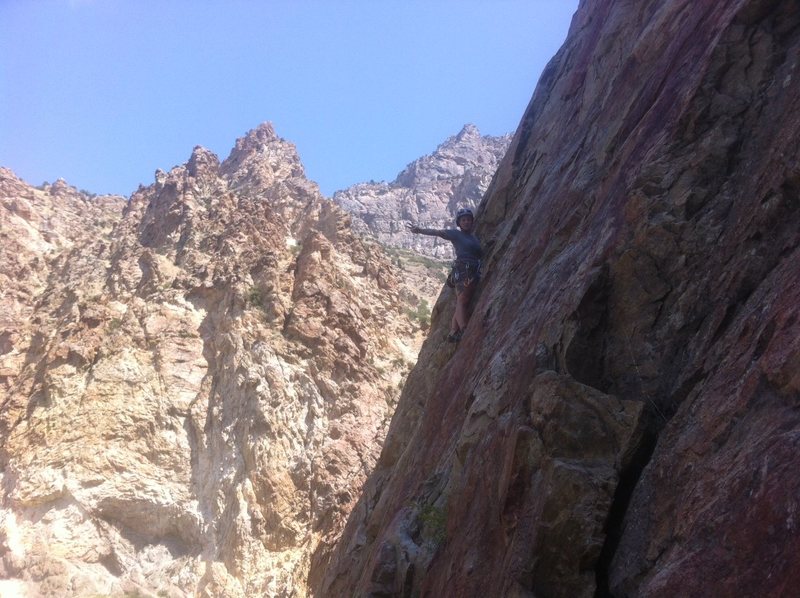 Leading the mantle, gets a little empty just above this, very fun, very scenic climb