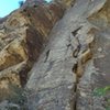 The first pitch goes up the obvious corner.  Left at the end of the corner, up a crack and  belay at a ledge<br>
