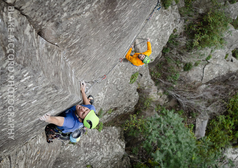 Joel Unema sticking the dyno on the first ascent. With Jeff Snyder belaying <br>
<br>
Photo: Blake McCord | [[blakemccordphoto.com]]http://www.blakemccordphoto.com
