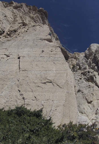 the right side of the cliff, up the arete and onto the face.