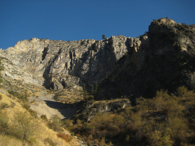 Large banded limestone cliff ( 45.141530°,-116.722176°), as seen from hells canyon road.