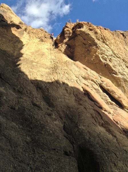 repelling down on the first pitch, lots of rope drag but faster than walking off.