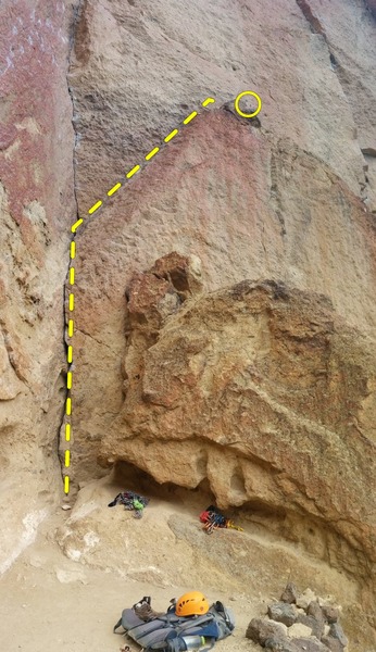 Route starts on the crack created by the left facing flake. Follow the flake to the top. Rap rings up top. <br>
Route indicated by yellow dotted line. Rap Rings circled.