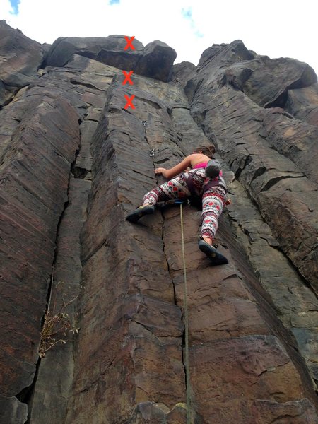 The route. Climb the easy, thin crack to three bolts.