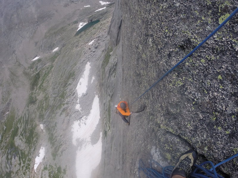 Doing the crux in the rain! Amazing exposure. Great route!