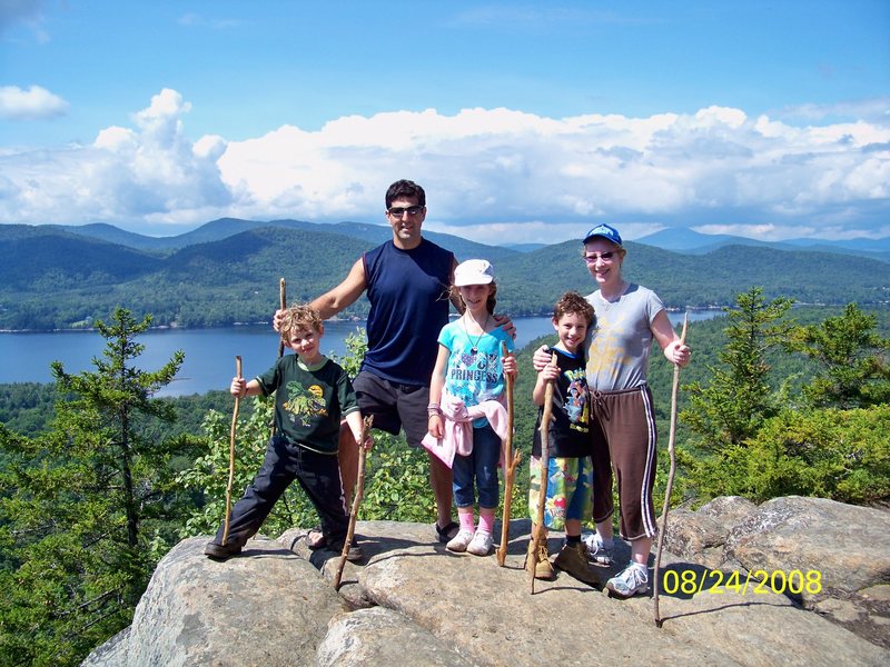 THE CHALNICK FAMILY ON BALDFACE MNT. OVERLOOKING INDIAN LAKE IN THE DACKS SUMMER 2008. IN ORDER TO CLIMB BALDFACE MNT. YOU FIRST HAVE TO KAYAK ACROSS THE LAKE AND LAND IN BEAUTFUL NORMANS COVE WHERE THE TRAIL HEAD STARTS.