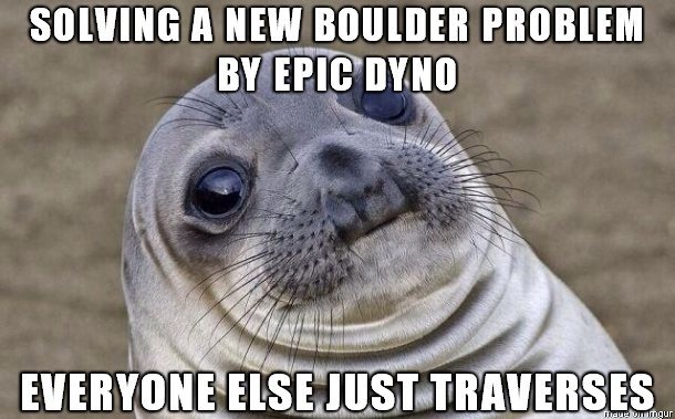 Often with no shirt, over balancing the feet with one handed hang momentum at the top, and doing a !fuck yeah, in the bag!movement with the free arm. <br>
and if outdoors, not topping out of the rock, just jumping to the crash pad.