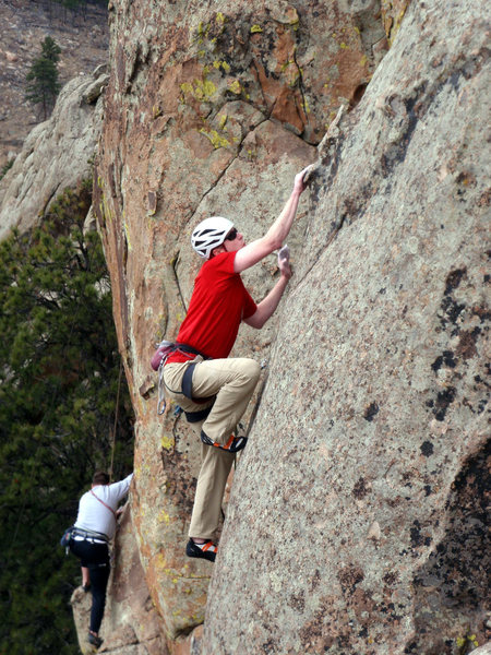 Guy just past the crux on Springtime.