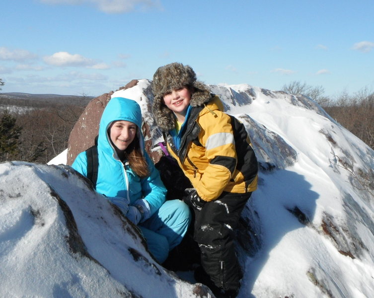 Jonah and Alexa Chalnick on summit in Bearford Mountains on way to Terrace pond to ice skate. Northwest NJ.