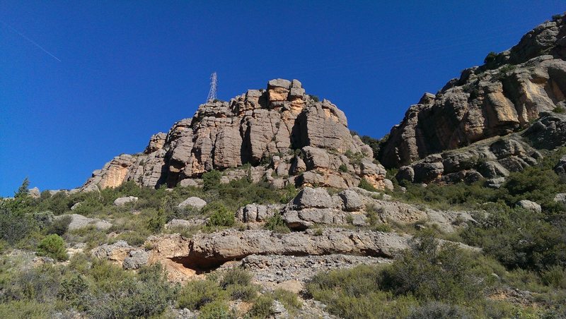 North end of the crag where the approach trail nears the cliffs.