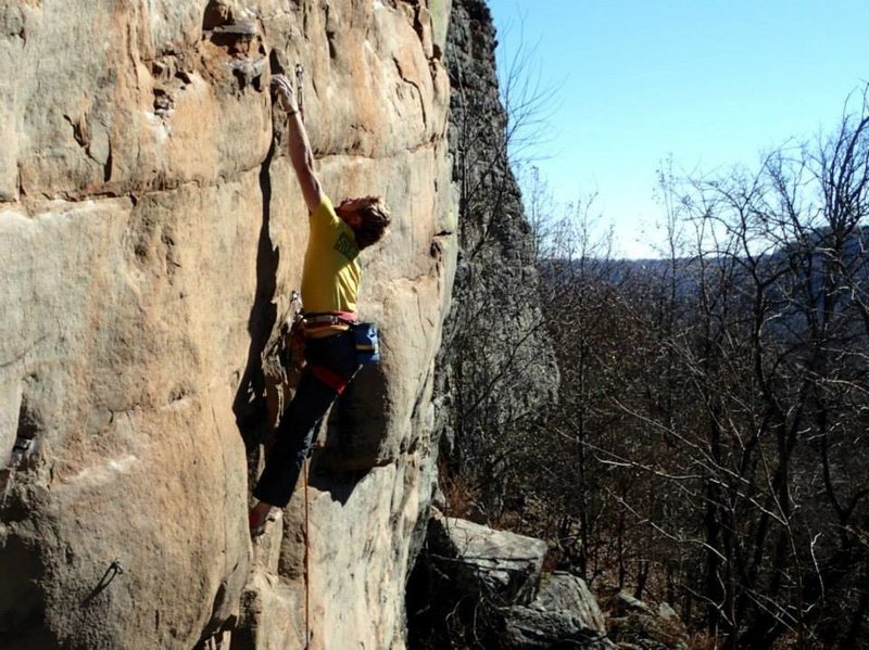 Tyler making the "long dynamic" crux move on Don't Be a Tool.