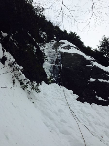 Route is on the left, going up the corner. Tilman's Arete goes up the right side. You can climb the cracks on the face for a full mixed route.