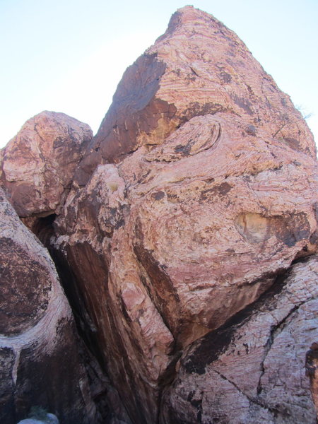A couple cairns will bring you under this formation, which has a slot at its base (The Crevasse).