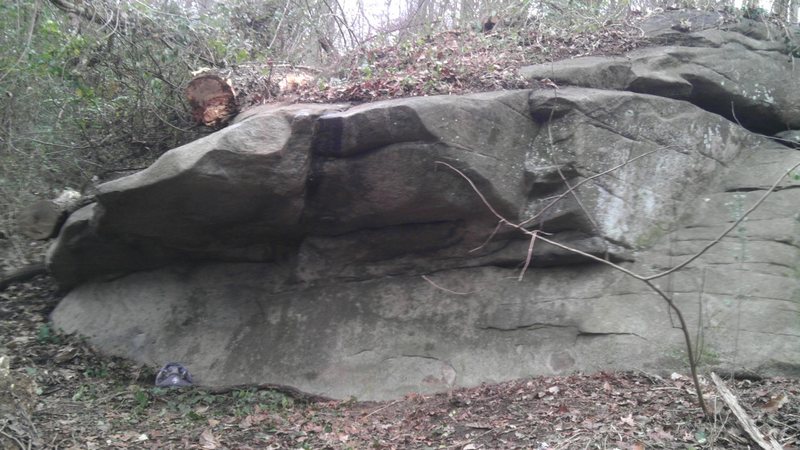 This short climb starts in the scoop right above where the chalk pot is in the picture.