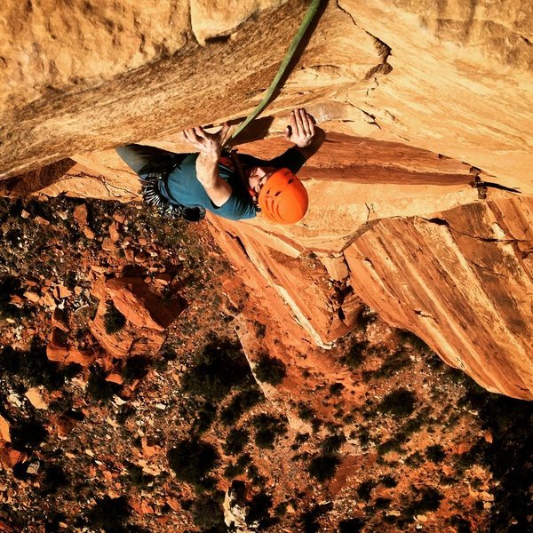 trying hard not to blow it on the "grip tape" slopers atop Pitch 4. Photo by C. Niggemyer