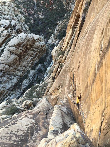 Brad G. follows the crux arete.