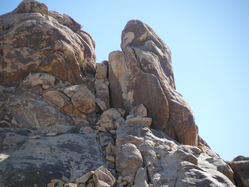 Romper Room goes up the arete on the pillar just right of the white dihedral