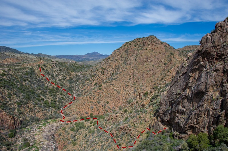 A view from the wall of the approach gully and hike from the highway. See the route description for more details.