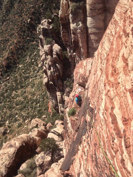 Looking back at the sweet ledge from partway up the final pitch on Olive Oil
