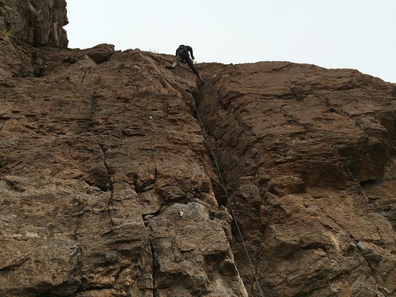 Michael Briseno at the anchors, bolt line left of rope.