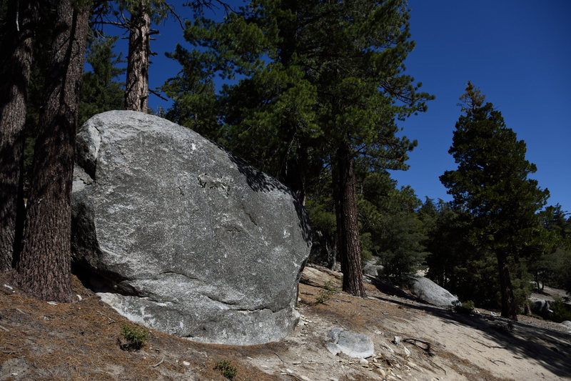 slab boulder at the beginning of the roadside corral