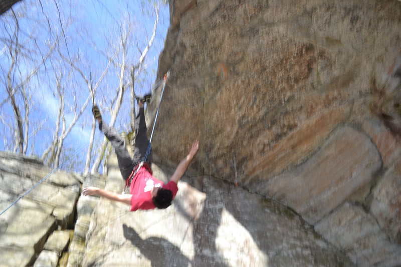 I fear the wolf now. My belayer came out from under the roof and my legs caught on the rope flipping me upside down as I fell. Props to Sam on the camera for catching this fantastic moment.