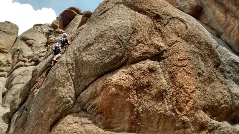 Mike Endicott farther up the shallow dihedral.