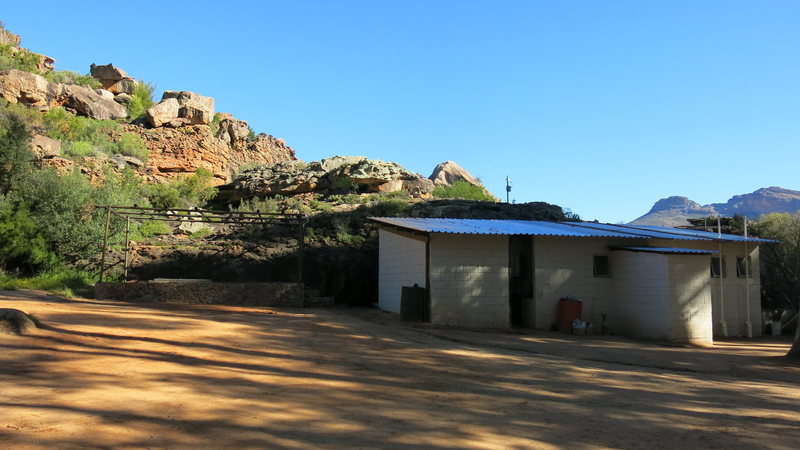 Kitchen is on the left, showers and toilets are on the right.