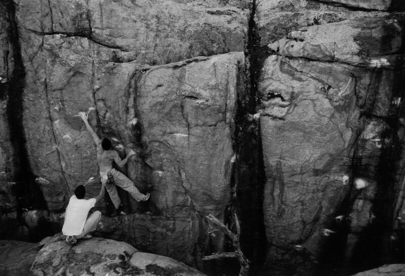 Mike Gasch dealing well with a Painful Truth V4, Thor's Chasm, Watson Lake, 1999.
<br>
<br>
Voodoo Blues is the chalked up black streak on the far right.