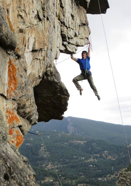 Keith at the end of the lip traverse, about to pull the roof and head up in the Charlie dihedral.