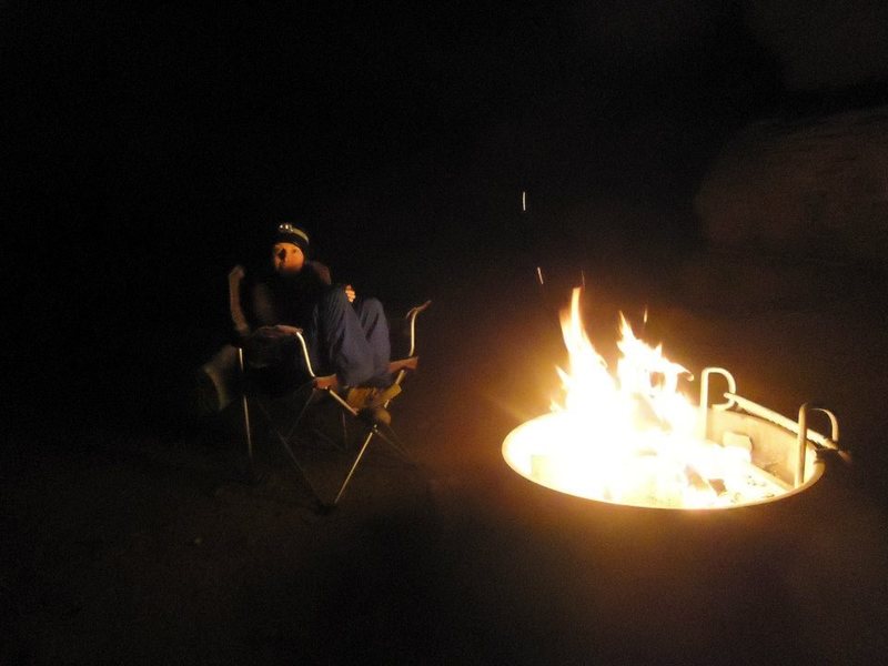 smiling whilst shivering, when the weather starts to take a turn for the worst, at least we have fire! indian creek camping mid april 2014
