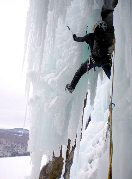 Climbing the free-standing pillar on Call of the Wild at Willoughby (WI6)